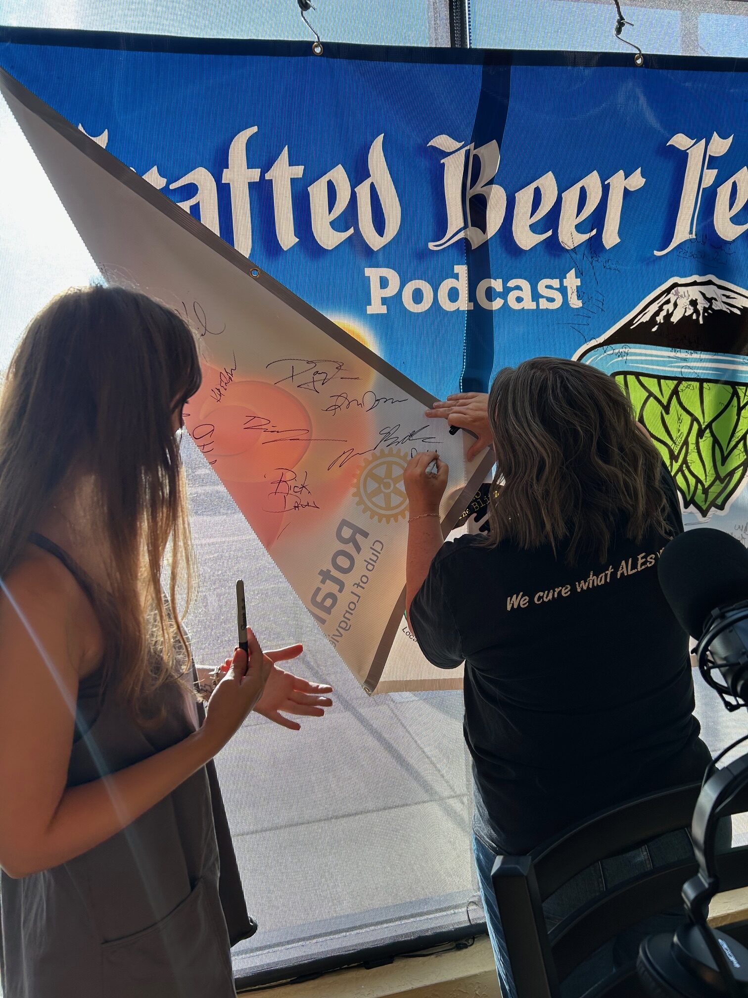 Dana From Antidote Tap House Signing Crafted Podcast Banner